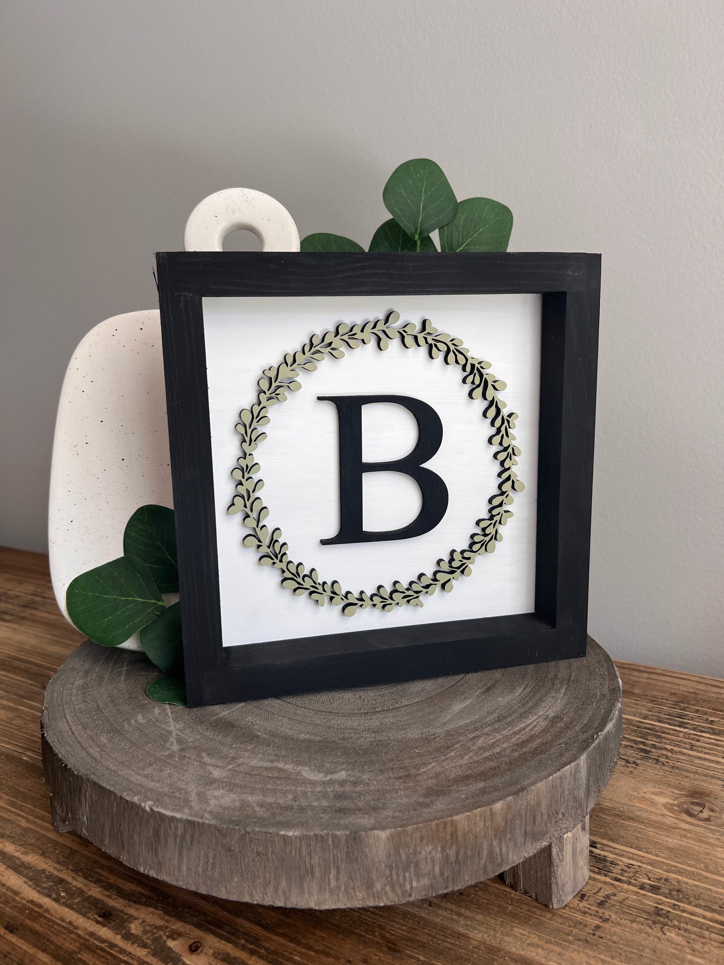 Small Initial Sign