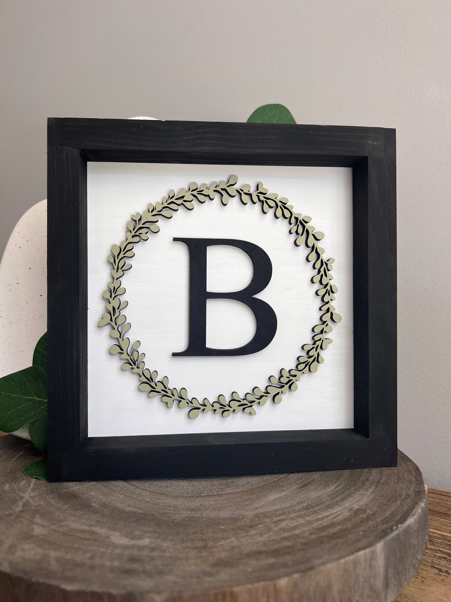 Small Initial Sign
